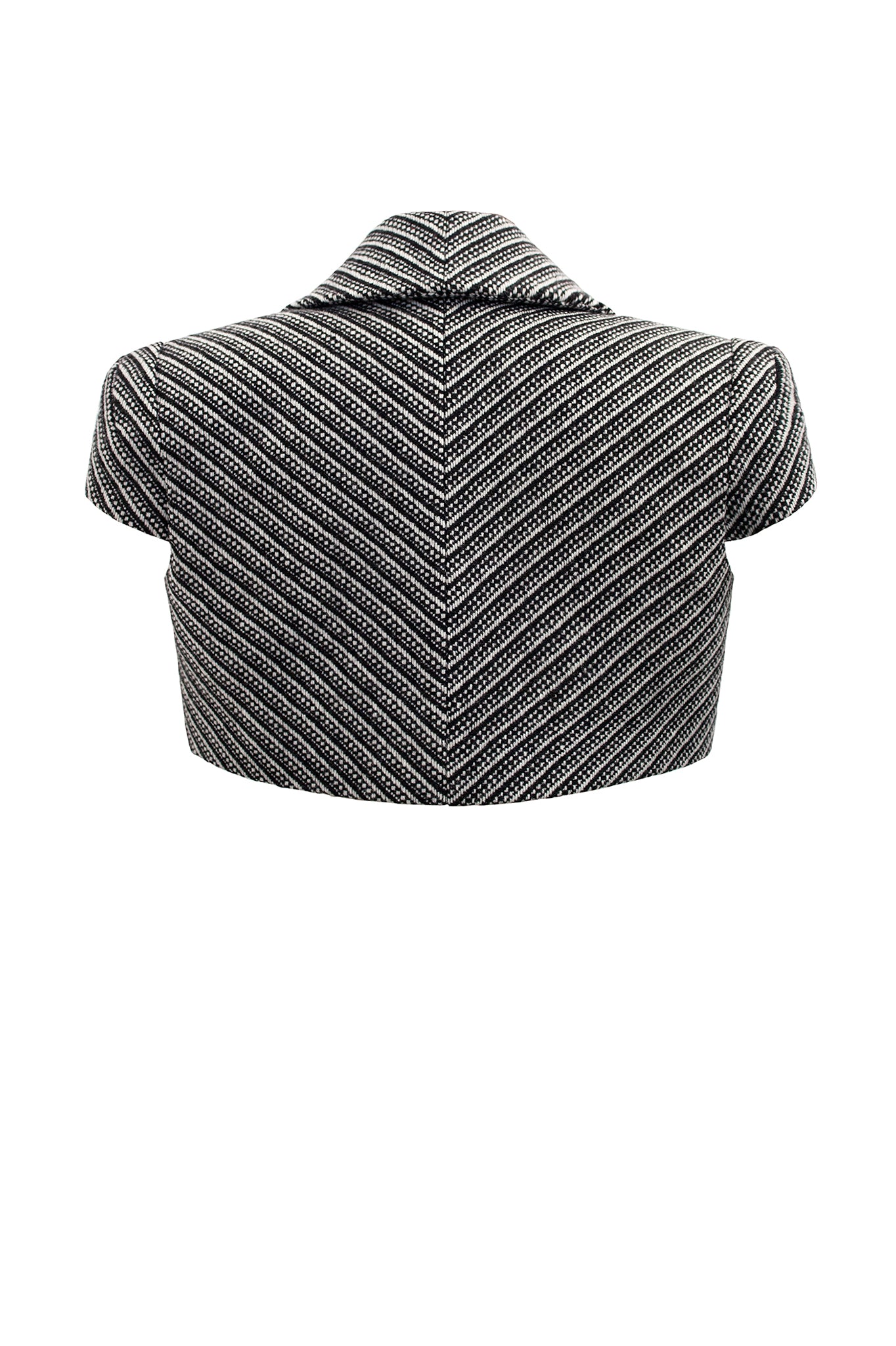 This cropped formal jacket, has a charming boyish boxy fit. The sleeve has a unique “stand away” construction for a sculptural shoulder. Worn on the catwalk. First seen on our AW17 (Fall Winter) catwalk during London Fashion Week.