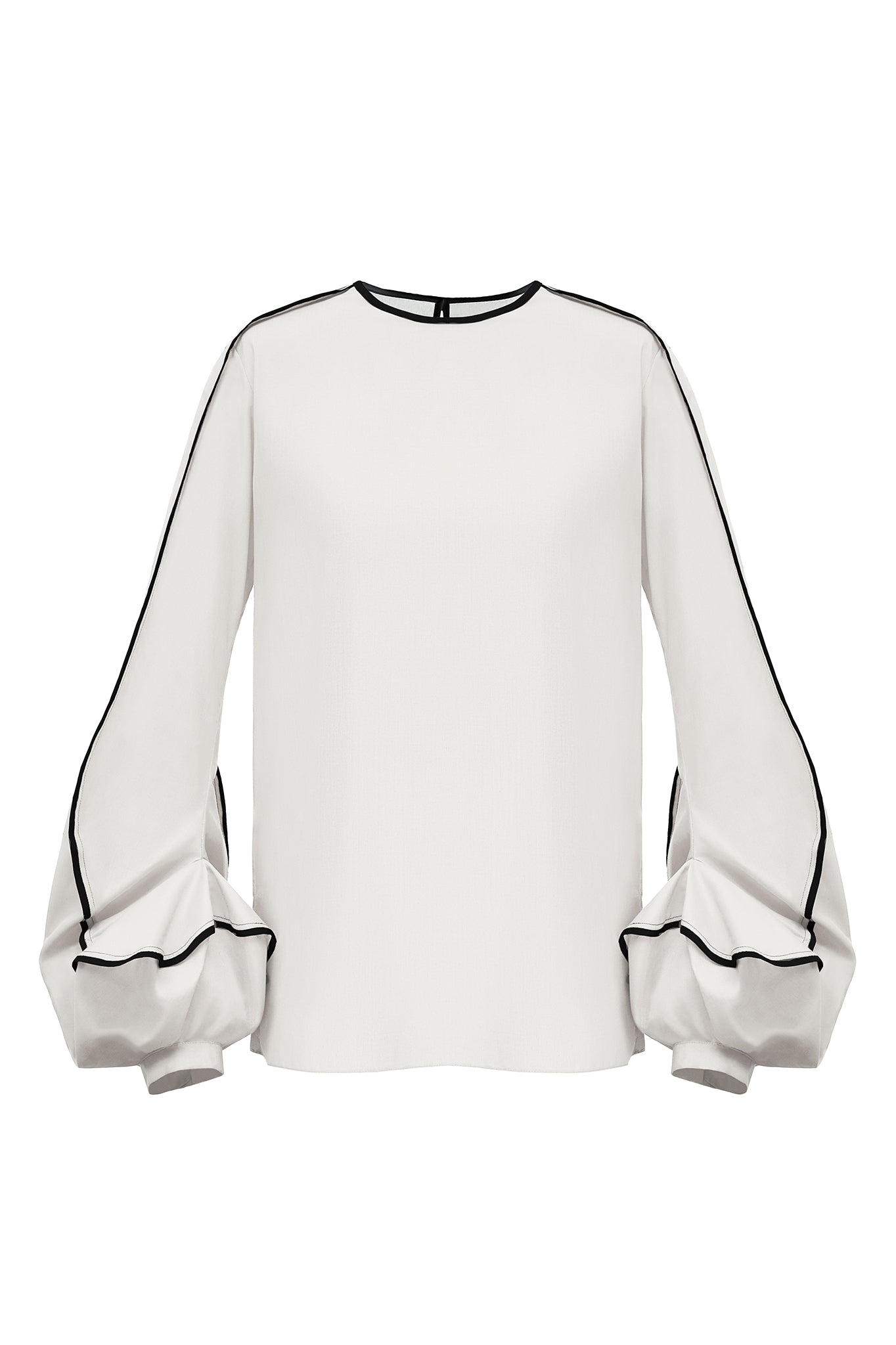 Cimone's AW17 black and white "dew" blouse has an unusual swirling cuff detail - the sleeve is bottom heavy with bound edges to highlight the fluid movement of the seam.