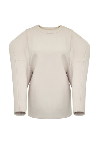 This casual sweatshirt-style top features gigantic exaggerated sleeves with an unusual dropped shoulder line. The colossal shoulders are enhanced by the clean nature of the body, and share the same sleeve construction as the “Extra” coat. The sleeves have been bonded in self, to give them a little more body and sumptuousness.  To close there is a zip in each of the shoulders. The inside is clean with bound seams to finish.