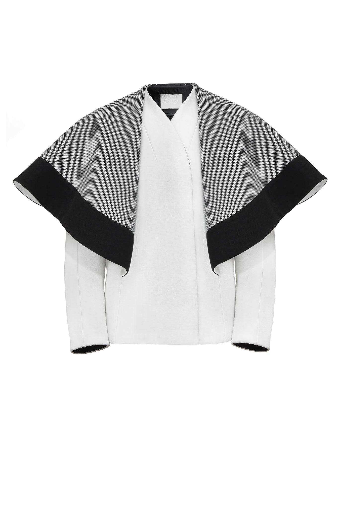 Cimone's sumptuous "Revolve" wrap jacket is an easy wear – luxurious fabrics are paired with a casual fit, finished off with a unique oversized circular collar. First seen on the catwalk in AW17.