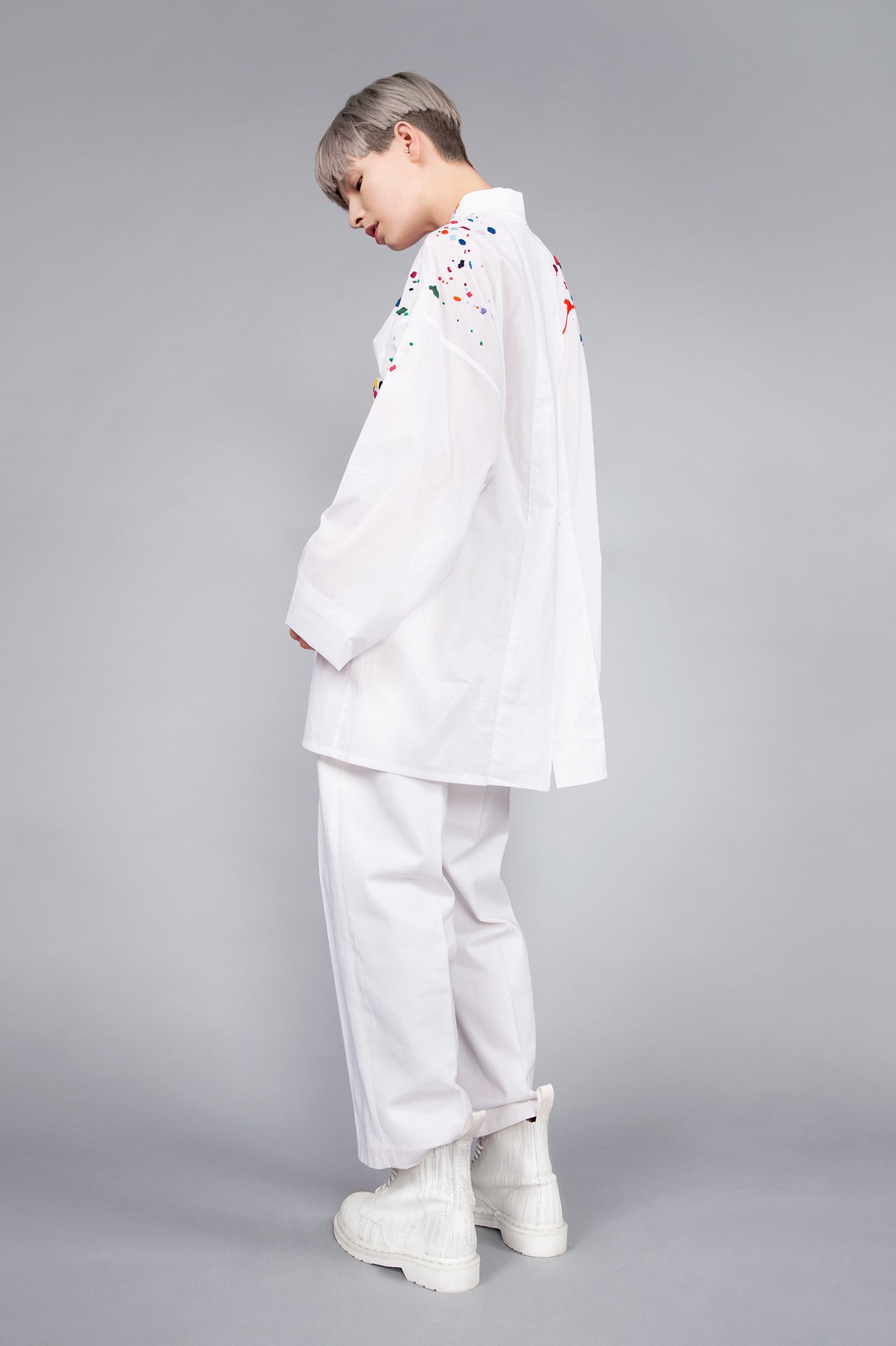 Colourful embroidered paint splashes on crisp white cotton 'cleave' shirt with a split back - from emerging brand CIMONE. Embellishments and overall look at echoed by Oscar de la Renta one year later in SS18 - be ahead of the trends and support new brands!